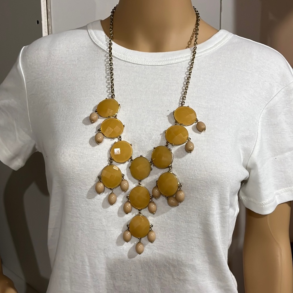 Vintage style long, creamy yellow bead necklace